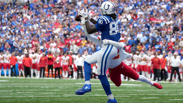 Indianapolis Colts tight end Jelani Woods (80) pulls in a touchdown catch while being guarded by Kansas City Chiefs safety Juan Thornhill (22) putting the Indianapolis Colts ahead with 24 seconds left in the game Sunday, Sept. 25, 2022, during a game against the Kansas City Chiefs at Lucas Oil Stadium in Indianapolis.